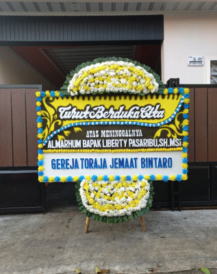 Papan Bunga Duka di Simpang Pasir